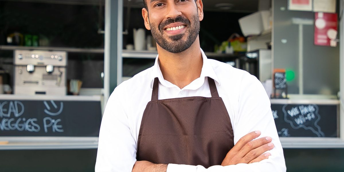 A business owner feeling confident and ready to apply newly acquired UI/UX knowledge to their website for real results.
