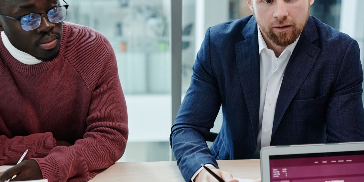 A team discusses data privacy and ethical implications of technology in a professional setting.