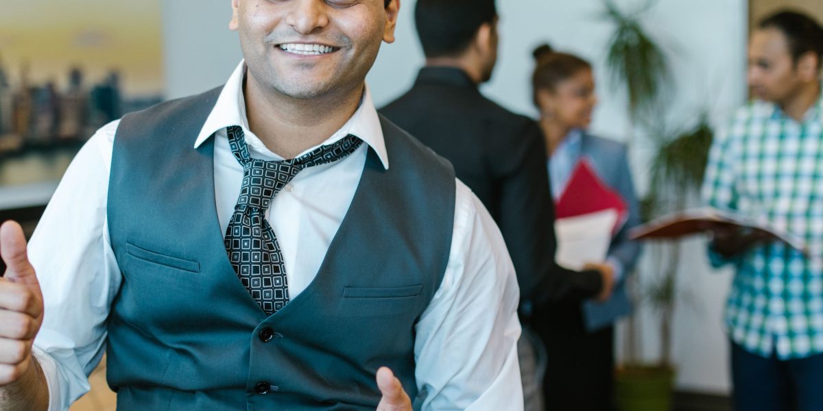 A satisfied client confidently shares positive feedback about a completed project or service.