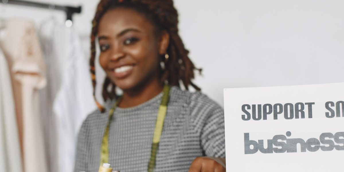 A small business owner juggling multiple responsibilities, highlighting the need for specialized assistance.