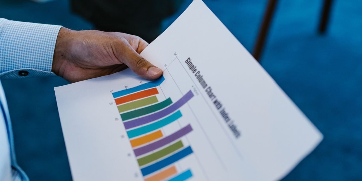 An individual reviewing performance reports, possibly looking for improvements.