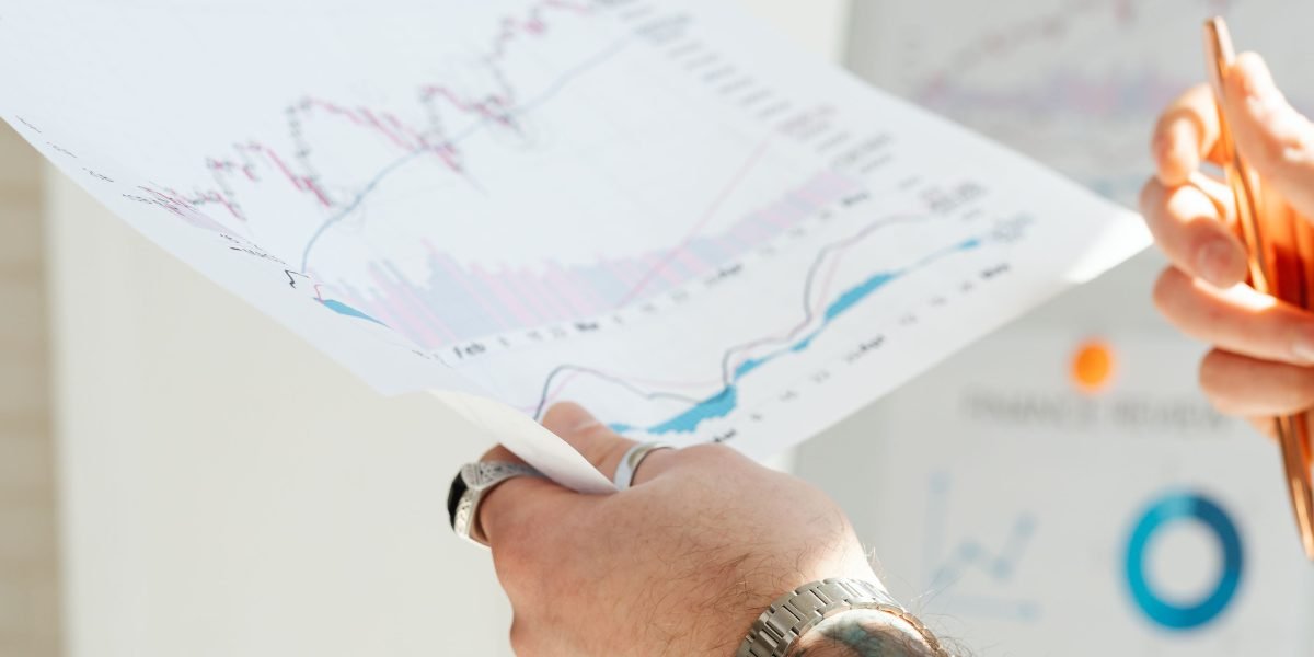 An individual focused on a large strategy board, illustrating thoughtful planning for business expansion and sustainability.
