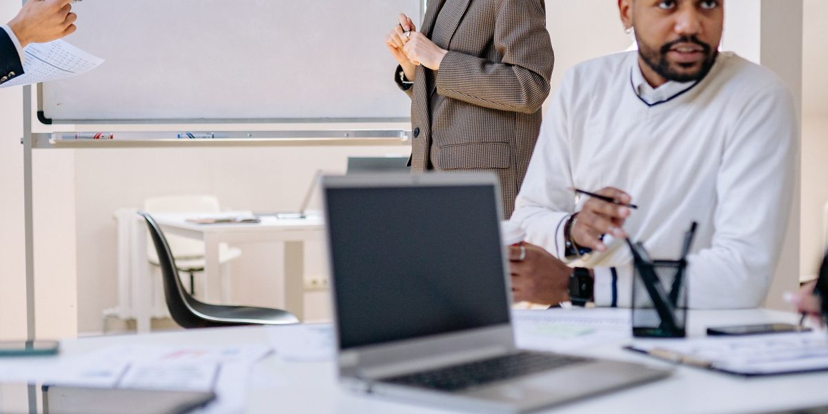A team actively collaborating on website design and marketing strategy to enhance lead generation.