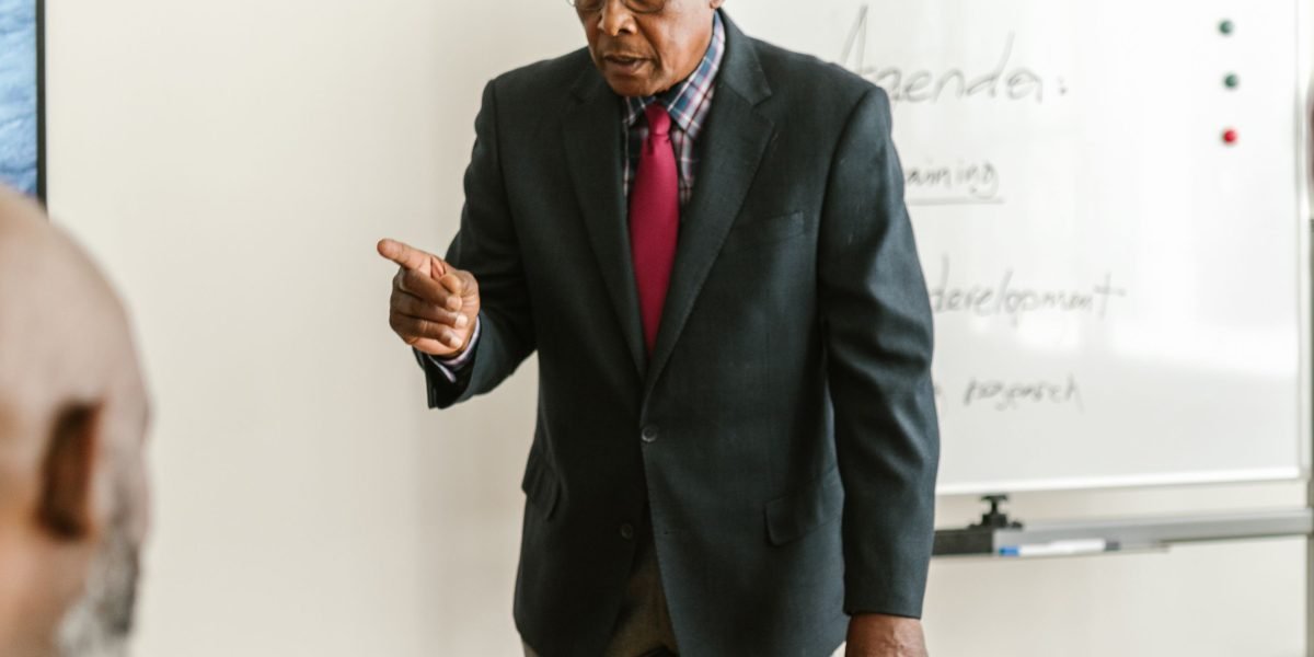 A scene depicting a confident business leader presenting a strategy, symbolizing growth driven by effective digital tools.