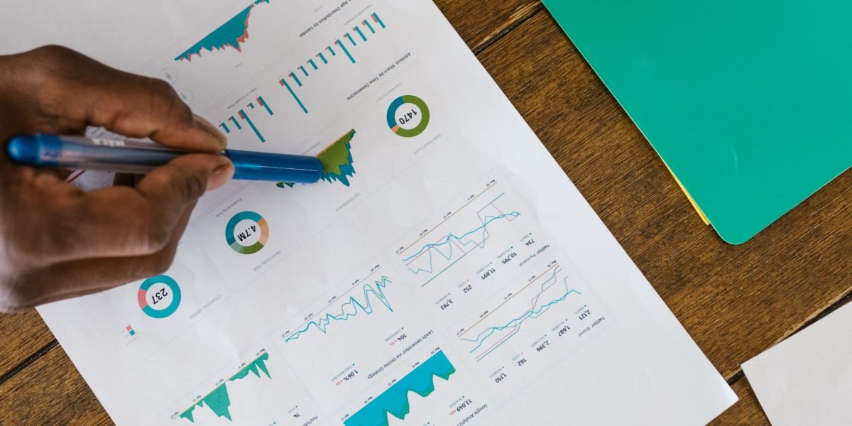 A business owner meticulously planning strategies to ensure consistent lead generation.