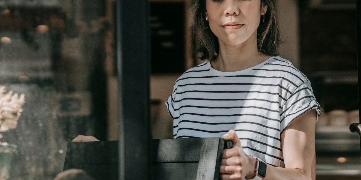 A small business owner looking worriedly at website performance data, reflecting lead generation challenges.