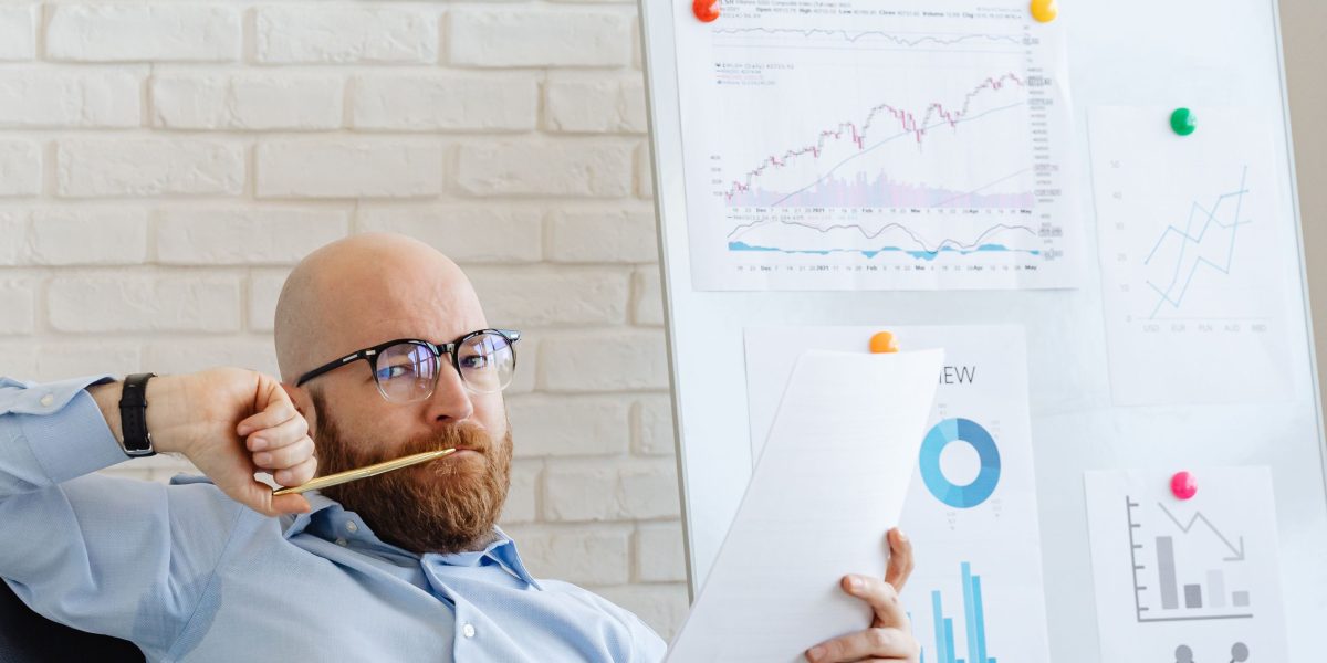 A dedicated business owner analyzing website performance data, reflecting on user experience and potential growth opportunities.