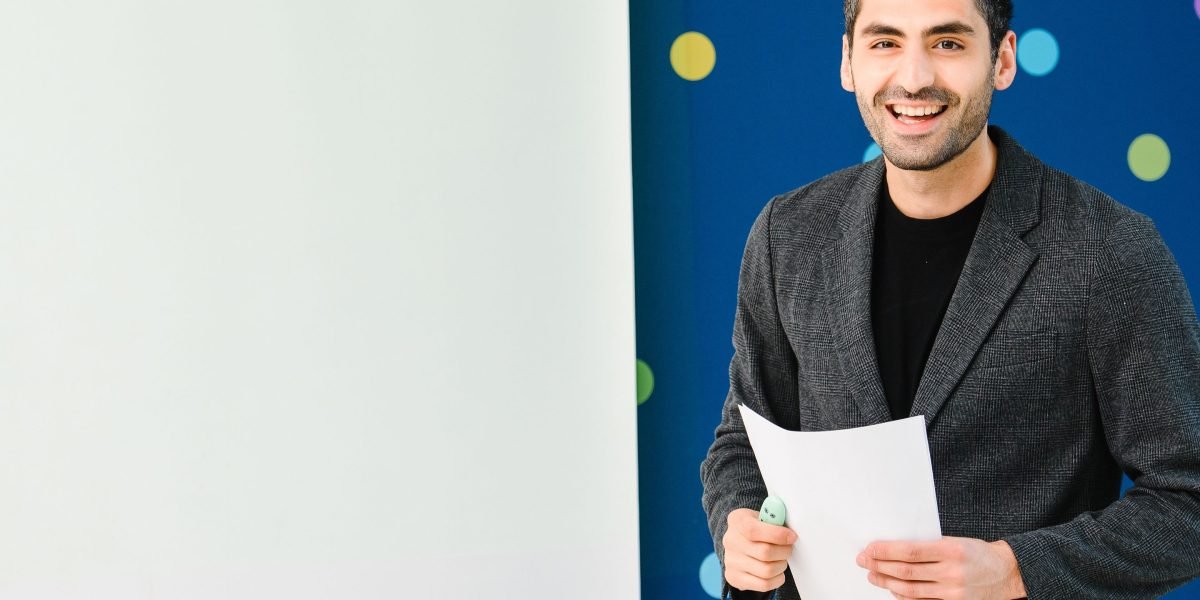 A designer confidently showcasing their portfolio, a crucial step for securing product designer jobs.