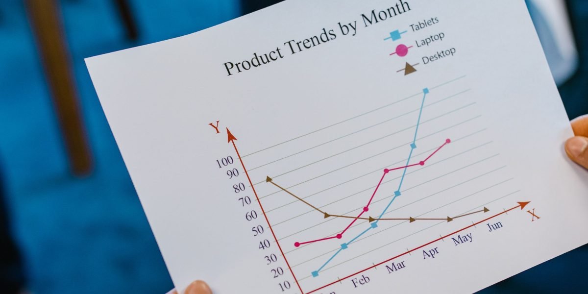 A business leader reviews performance metrics and analytics to guide strategic website improvements.