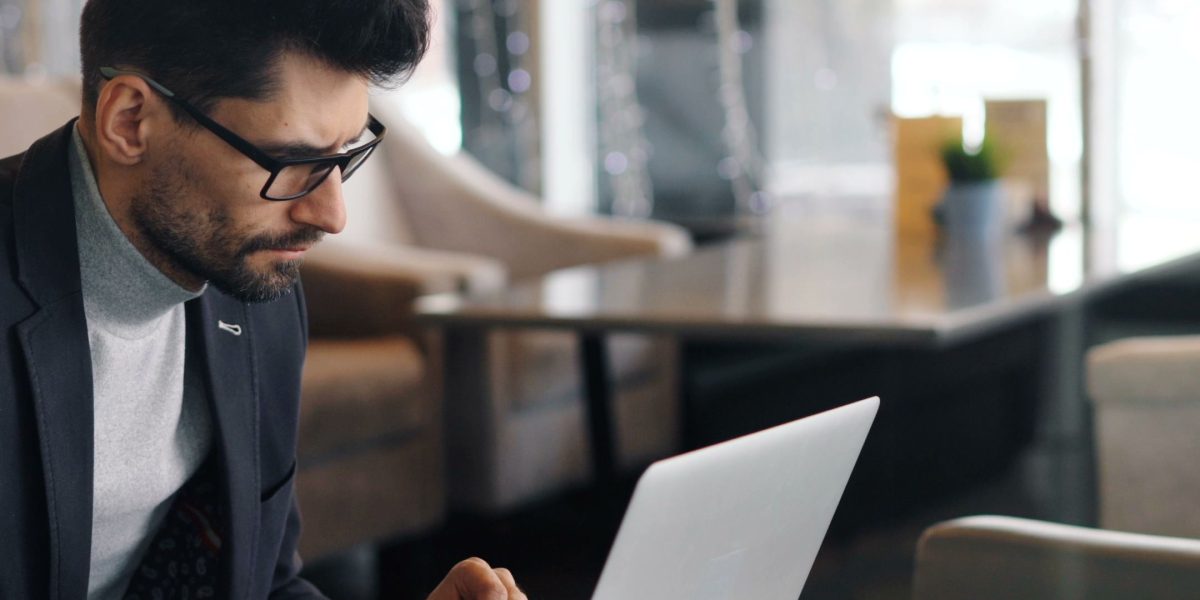 A person engaged in online learning in a relaxed setting, illustrating the flexibility of self-paced or remote instructor-led courses.