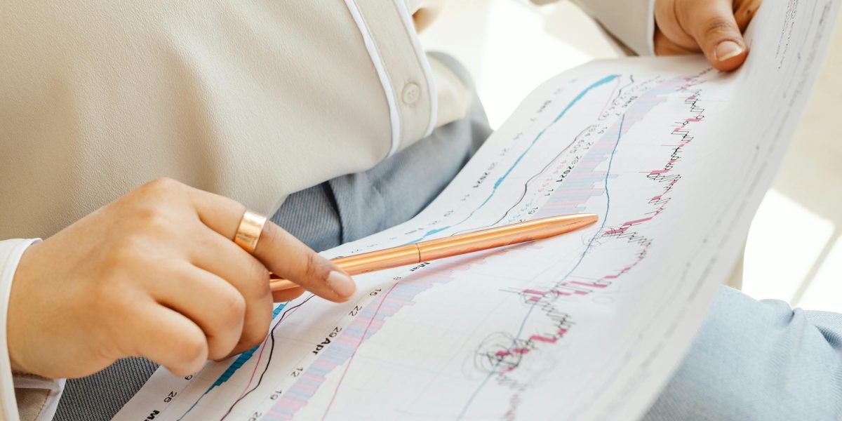 A business professional confidently reviewing data or analytics, symbolizing successful lead generation.