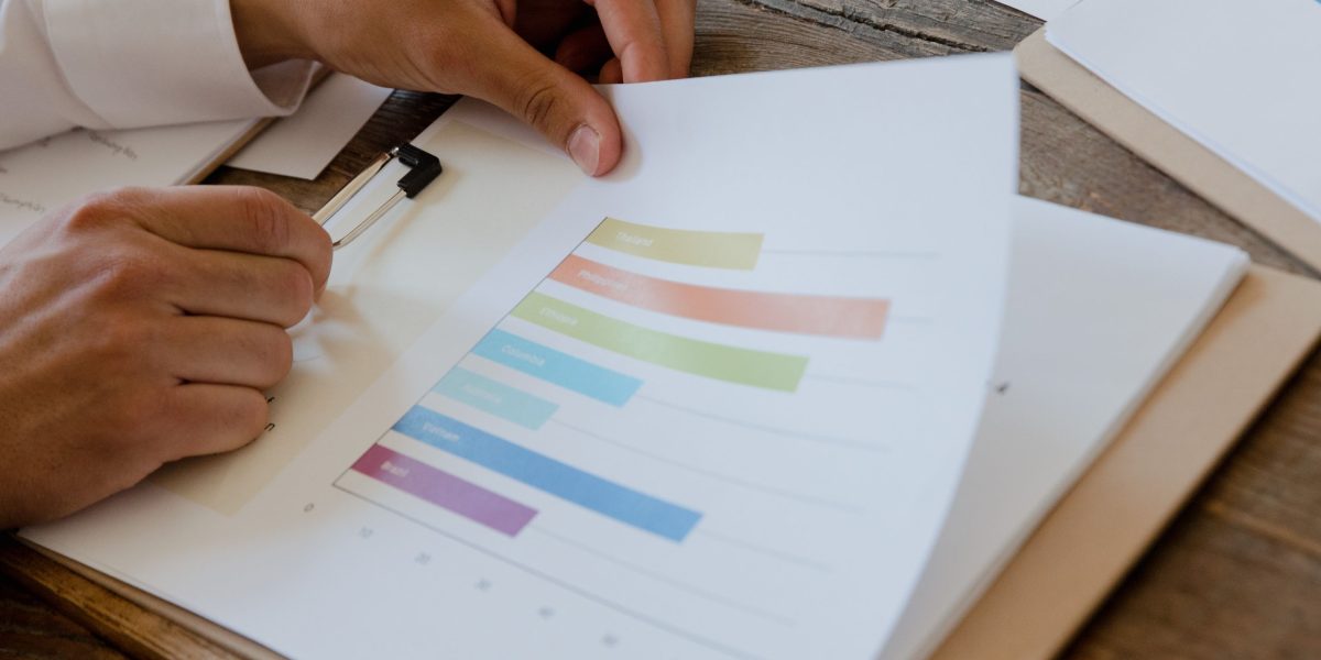 A small business owner intently reviewing analytics reports, seeking insights into website performance and lead generation.
